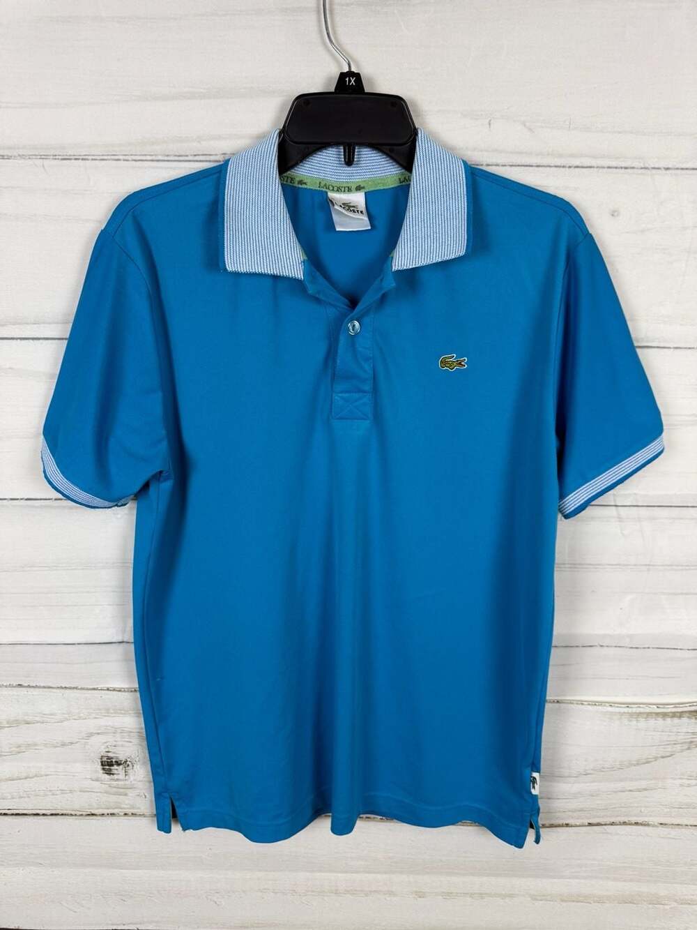 Lacoste Sport Blue Polo Shirt with Striped Collar and Cuffs